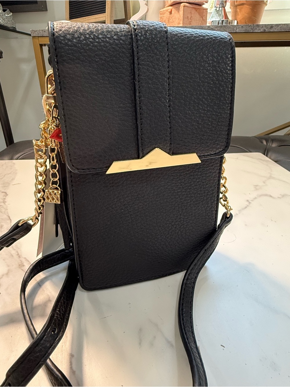 Black Crossbody Phone Pouch with Gold Accent